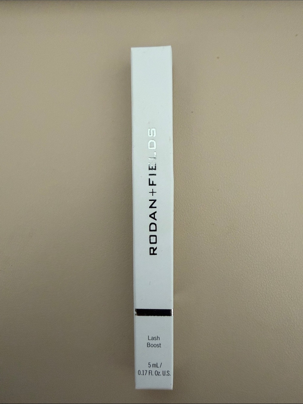 Rodan + Fields Lash Boost Serum - White and Black Accents